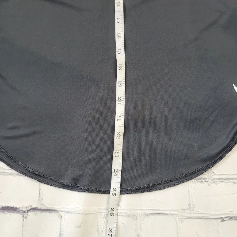 Nike Dri fit woman’s black lightweight active y-shirt size S